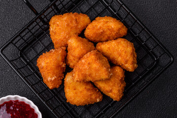 Brie cheese or camembert fries in breading, fast food, takeaway
