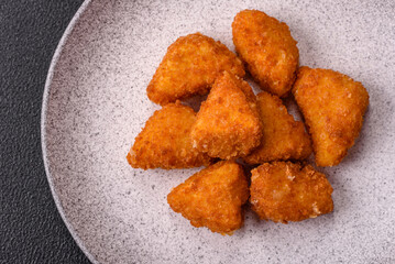 Brie cheese or camembert fries in breading, fast food, takeaway