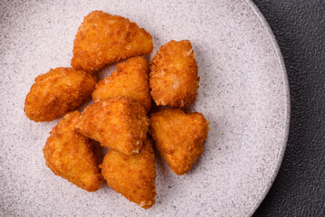 Brie cheese or camembert fries in breading, fast food, takeaway