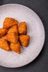 Brie cheese or camembert fries in breading, fast food, takeaway