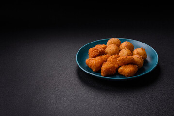 Brie cheese or camembert fries in breading, fast food, takeaway