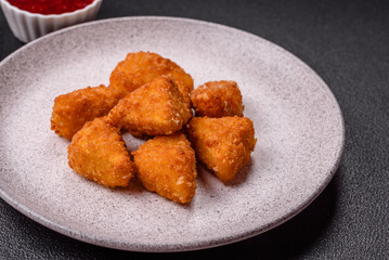 Brie cheese or camembert fries in breading, fast food, takeaway