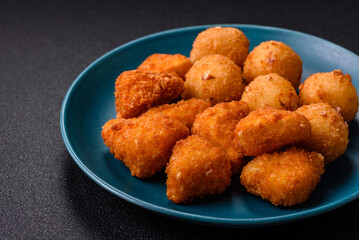 Brie cheese or camembert fries in breading, fast food, takeaway