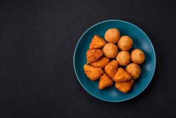 Brie cheese or camembert fries in breading, fast food, takeaway