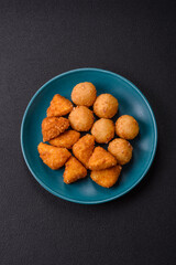 Brie cheese or camembert fries in breading, fast food, takeaway