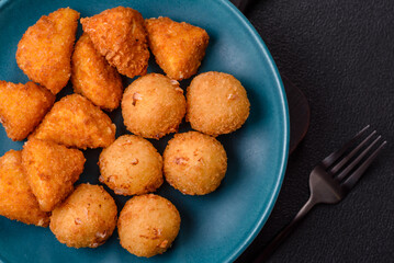 Brie cheese or camembert fries in breading, fast food, takeaway