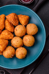 Brie cheese or camembert fries in breading, fast food, takeaway