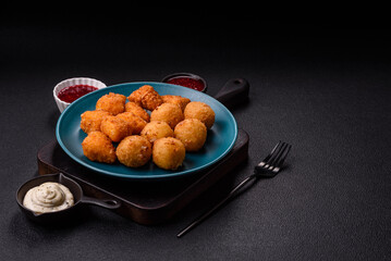 Brie cheese or camembert fries in breading, fast food, takeaway