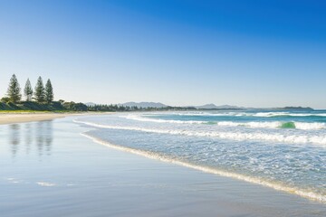 Obraz premium pod of dolphins leaping gracefully out of sparkling ocean waves in Byron Bay. 