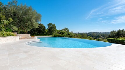 A beautiful modern pool surrounded by lush greenery under a clear blue sky, perfect for relaxation and enjoyment