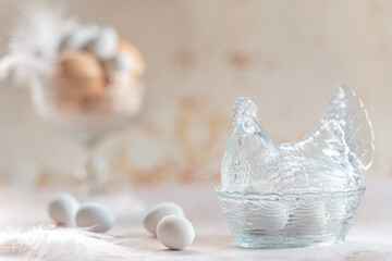 Decorative glass chicken bowl and eggs evoke farmhouse charm. Perfect for product packaging, Easter campaigns, or traditional kitchenware promotions.