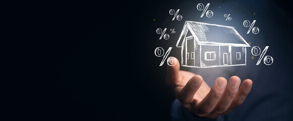 businessman holding house with drawn percentage icons