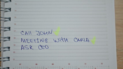 Hand marking completed tasks at workplace closeup. Man worker putting marks