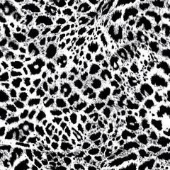 Seamless black and white leopard print pattern showcasing organic shapes and textures