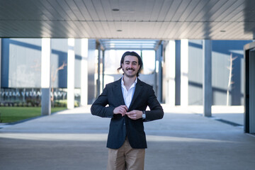 Fototapeta premium Confident Businessman Smiling Outdoors Offering Growth Solutions In Banking, Real Estate, Or Insurance.