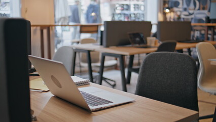 Laptop workplace without people closeup. Modern computer standing office desk