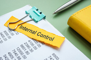 Accounting documents marked internal control. Corporate compliance.