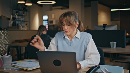 Focused copywriter writing notes at open space closeup. Woman writing notebook