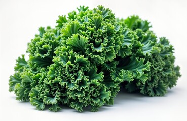 Fototapeta premium Fresh green kale leaves stacked on white background. Closeup of healthy, organic vegetable. Raw kale ingredient. Vegan food for healthy diet. Natural, fresh product. Ideal for salads, smoothies.