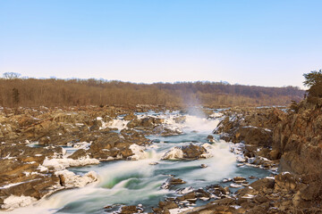 View of partially frozen Great Falls of the Potomac River from Olmsted Island in winter