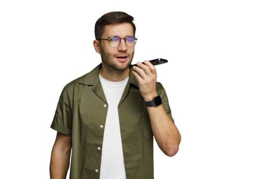 Man using voice recorder to capture important notes while in casual attire at home