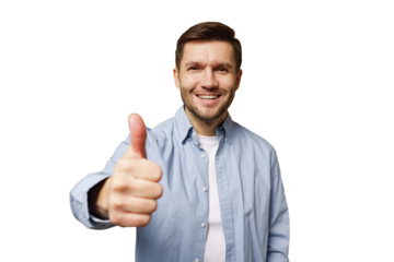 Man smiling and giving thumbs up in casual attire against plain background