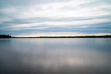 Long exposure lake view with reflections.