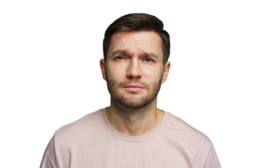 Man with neutral expression wearing a light shirt, staring directly at the camera in a studio setting