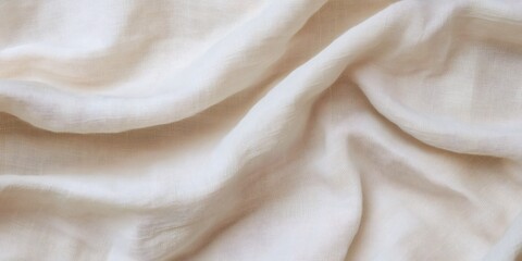 Light beige linen fabric gently flowing and creating elegant folds, perfect for backgrounds and design projects