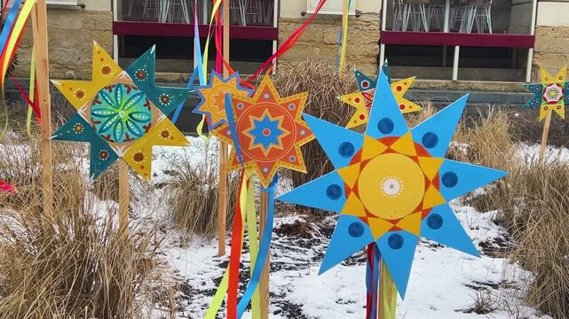Ukrainian traditional Christmas decorations in the form of Bethlehem stars on the central square of Lviv.