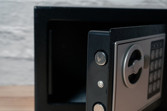 Open door Safe or home security box with key and digital keypad. - Powered by Adobe