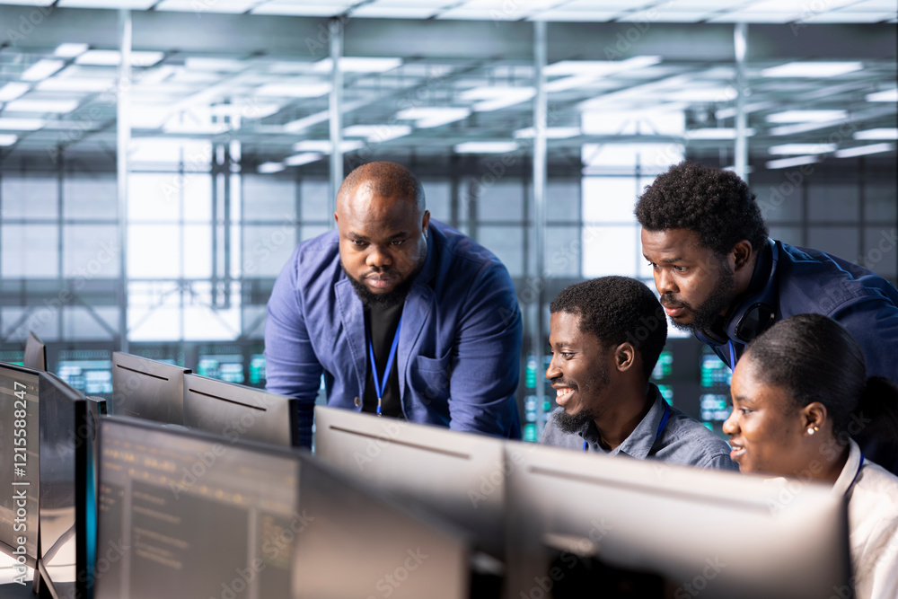 Poster management executive checking on data center employees creating technical documentation for software
