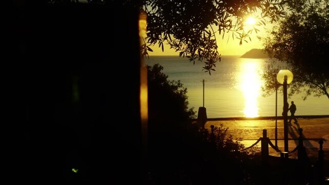 People Silhouette near the Seaside and Morning Sunrise Light in Turkey Datca