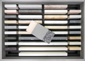 A sample of artificial acrylic stone for kitchen countertops and other furniture. Stone texture for...