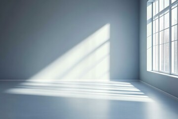 Fototapeta premium stock photo features a minimalist white and gray studio background providing a clean and neutral setting for various subjects and allowing for easy integration of text or graphics