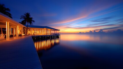 Fototapeta premium Sunset over a private beach property, modern architectural design, soft ambient lighting, ad layout space, serene and high-end feel