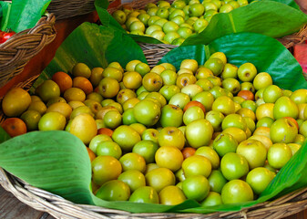 jujubes in basket on table in market