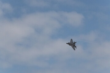 F35 doing stunts at air show and breaking sound barrier. Sonic boom