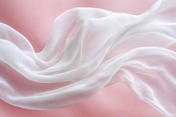 Flowing white fabric on pink background.