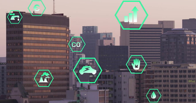 Image of network of eco icons over cityscape