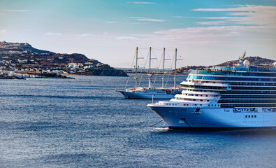 Fototapeta premium Cruise Ship and Sailboat in Mykonos Greece