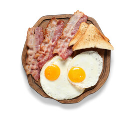 Board with tasty fried eggs, toasts and bacon on white background. Top view