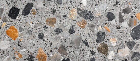 Abstract Cement Texture with Colorful Stone Inclusions Ideal for Background or Design Elements Featuring Space for Text Overlay