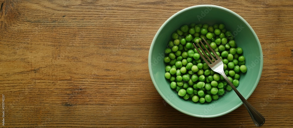 Aufkleber bowl of fresh green peas and fork on rustic wooden table inviting healthy eating with empty space fo