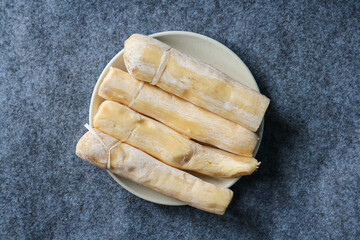 Tapai singkong or peuyeum are traditional foods (snack from indonesia) made from fermented cassava