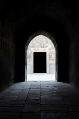 Dark Tunnel Leading to Light Stone Doorway