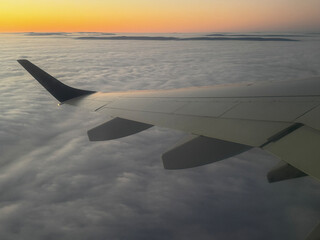 Fototapeta premium Winter with extreme fog over the North German Plain. After take-off from Hanover airport, even the German low mountain Deister with the Anna Turm and behind it the Süntel rise out of the high fog. 