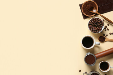 Cups of hot coffee with beans, sweet chocolate and portafilter of powder on yellow background