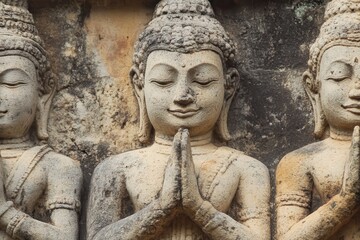 Experience serene beauty in the historic ruins of Polonnaruwa with ancient statues and intricate stone carvings. Generative AI