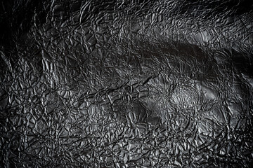 鈍い光を放つ金属背景